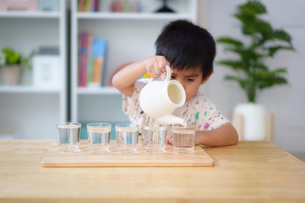 Read more about the article 20 Montessori Practical Life Activities that can be Setup at Home